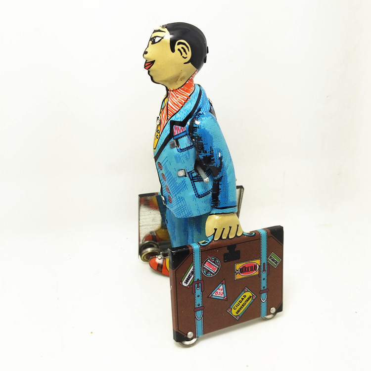 איש עם מזוודה מוצר רטרו מפח