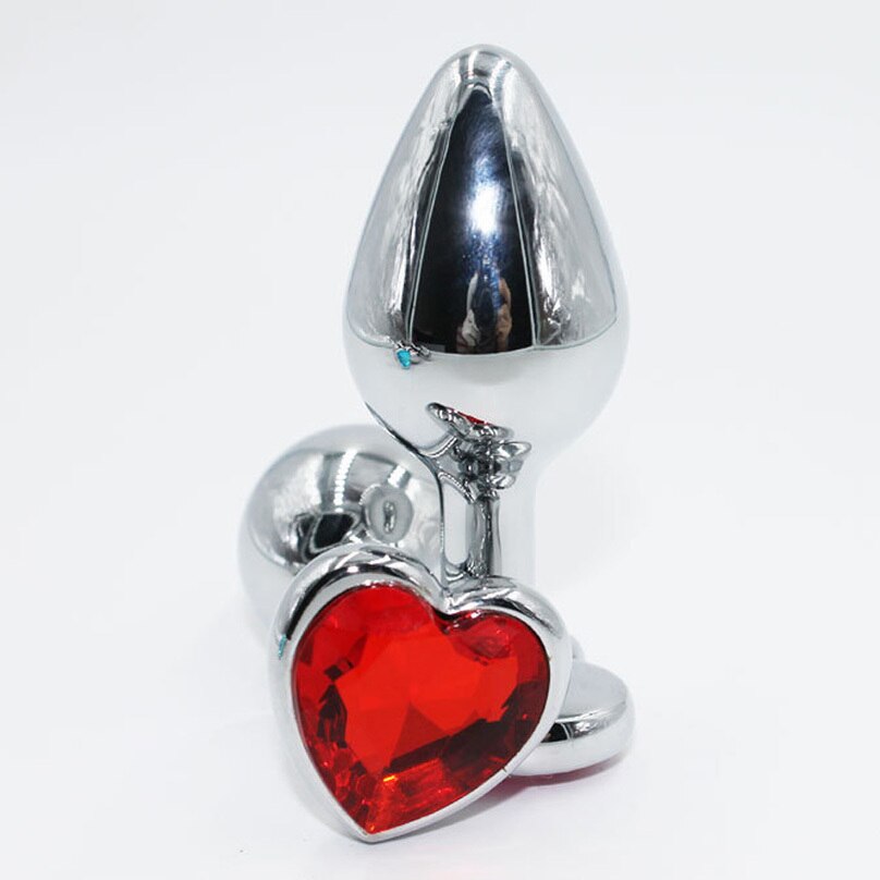 פלאג אנאלי מתכת קטן עם אבן אדומה בצורת לב