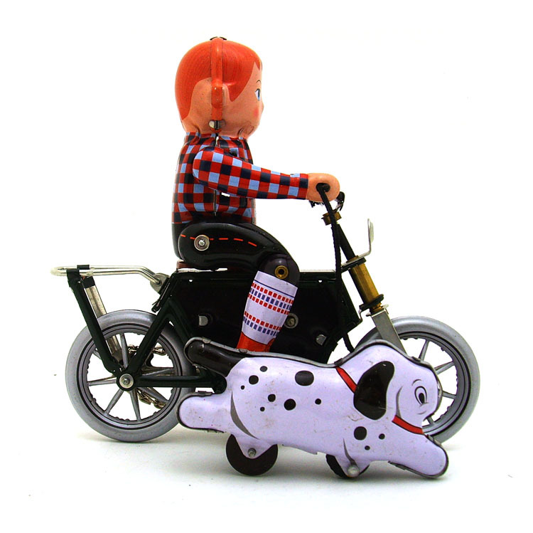 וינטג ילד על אופניים עשוי פח בעבודת יד - צעצועים של פעם
